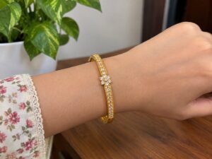 Elegant Floral Accent Gold-Plated CZ Bangle Bracelet